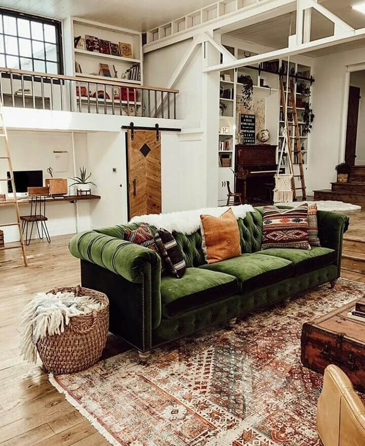 A Vintage Industrial Barn Home With A Beautiful Green Velvet Sofa