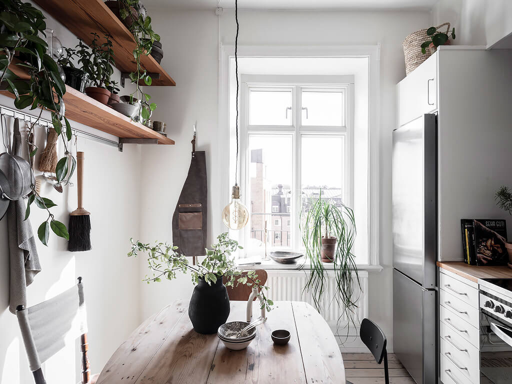 small blue scandinavian apartment nordroom8 A Charming Swedish Apartment with Blue Walls and Plants