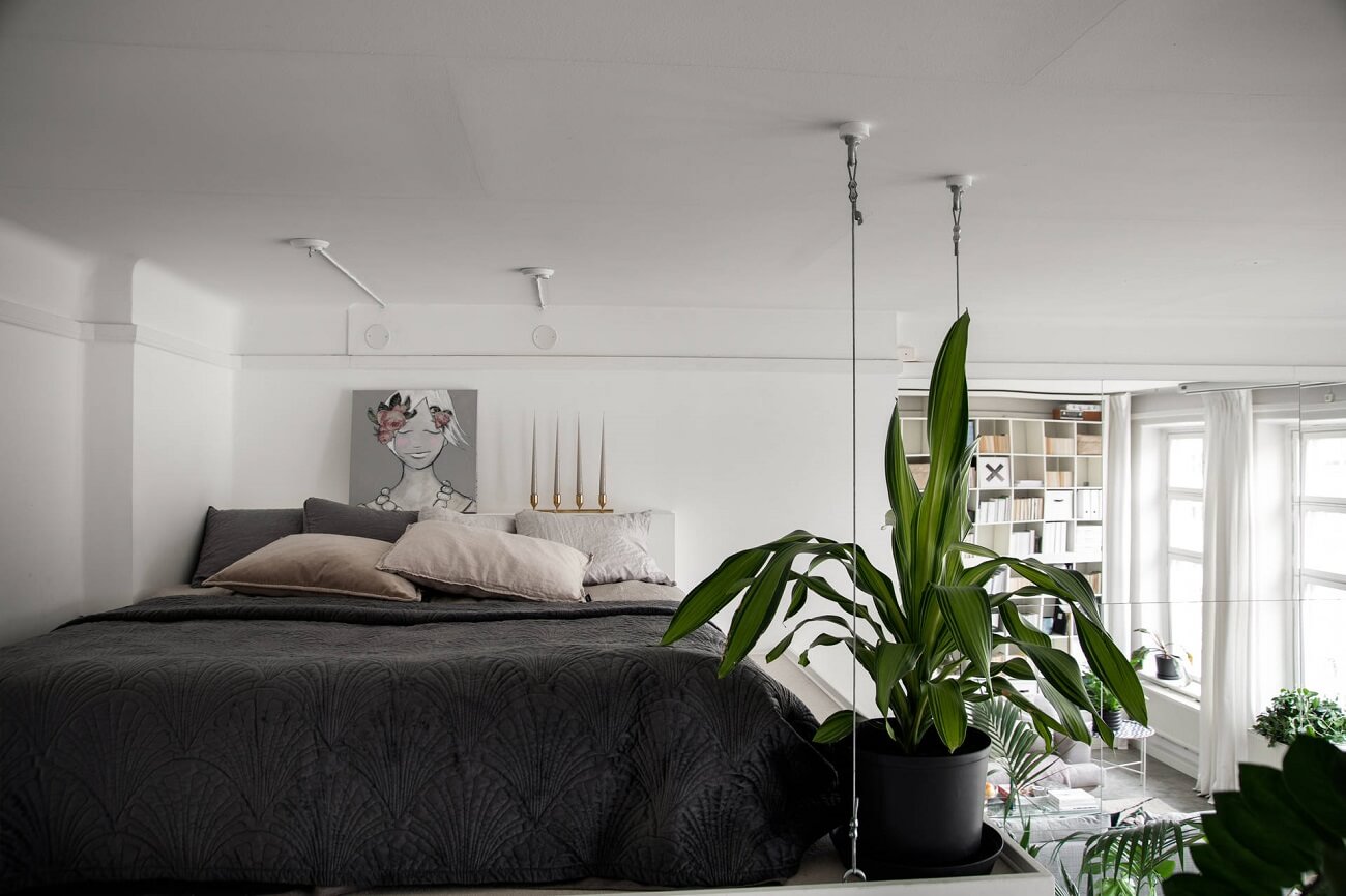 small scandiniavian loft nordroom11 A Small Scandinavian Loft Looks Spacious Thanks To A Mirrored Wall