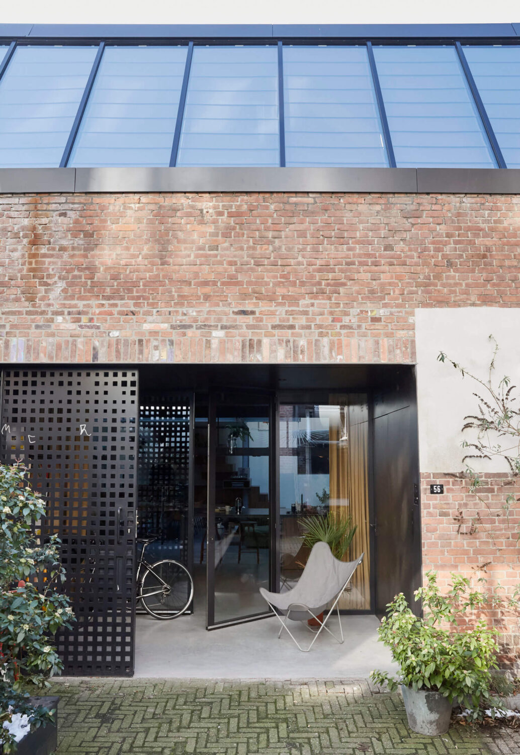 Industrial Luxury Factory Conversion Reference: A Warm Industrial Factory Conversion In Amsterdam