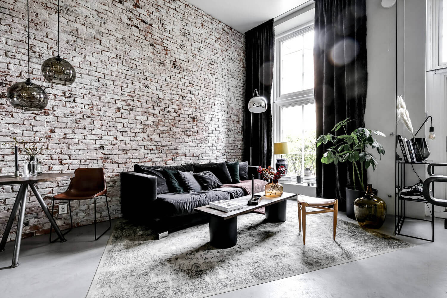 An Industrial Scandinavian Apartment with Exposed Brick Wall