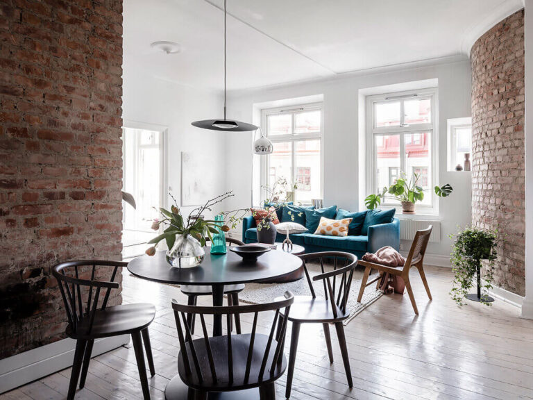 A Scandinavian Apartment with Exposed Brick Wall and Colorful Touches ...