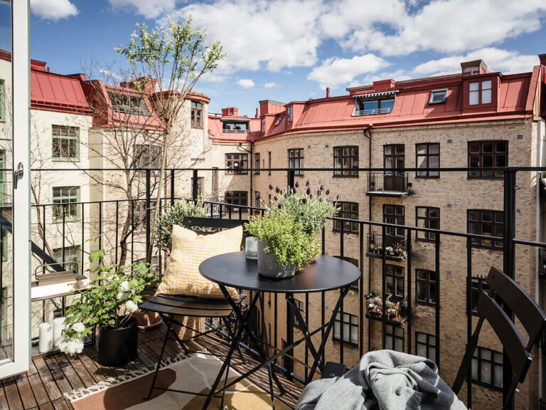 A Scandinavian Apartment with Exposed Brick Wall and Colorful Touches ...