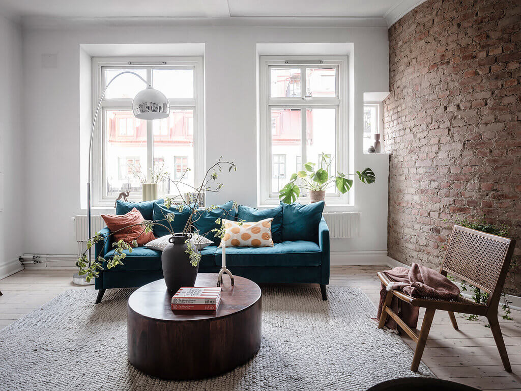 scandinavian apartment exposed brick nordroom5 A Scandinavian Apartment with Exposed Brick Wall and Colorful Touches