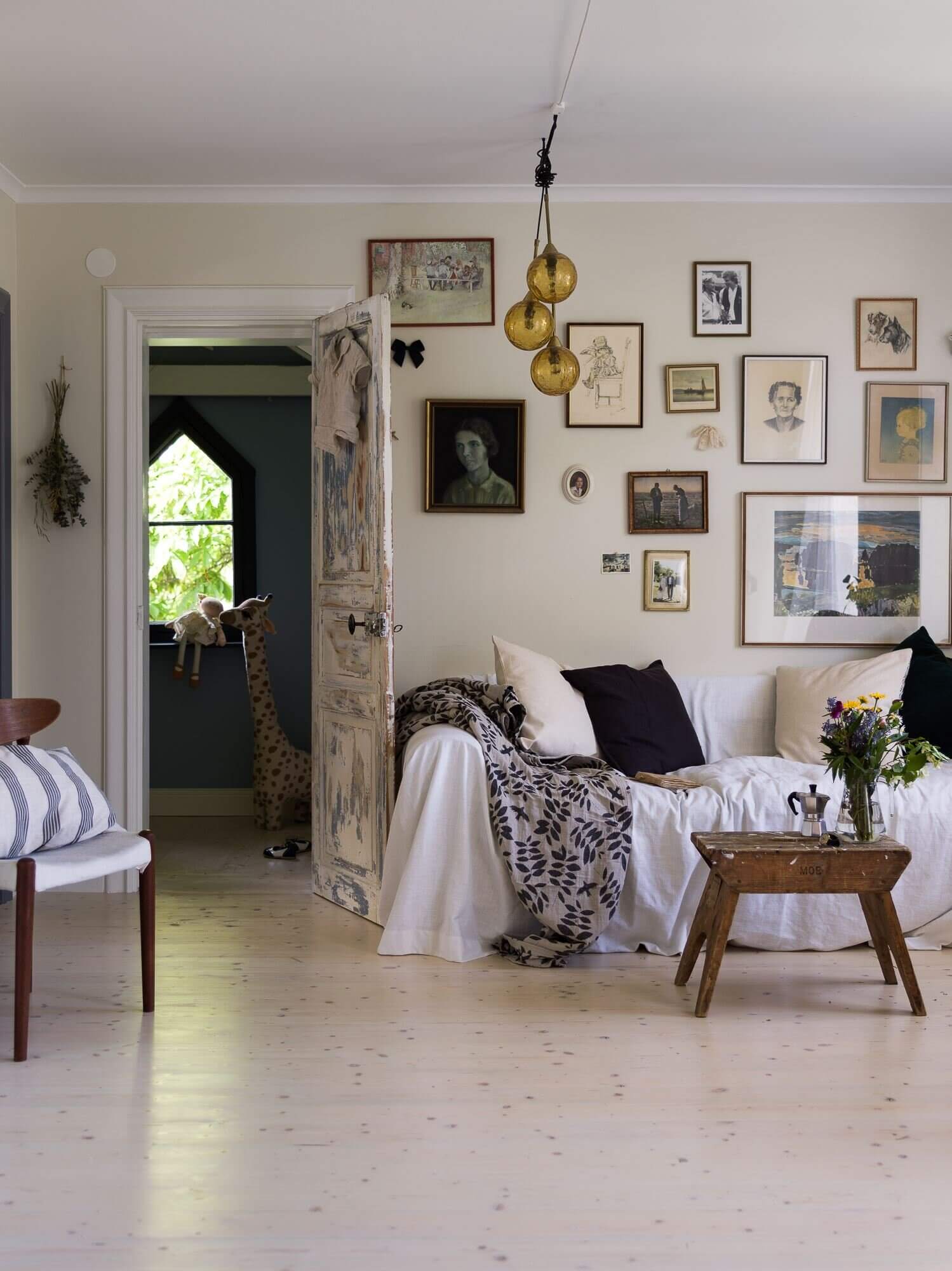 A Vintage Apartment with a Black Kitchen in Sweden