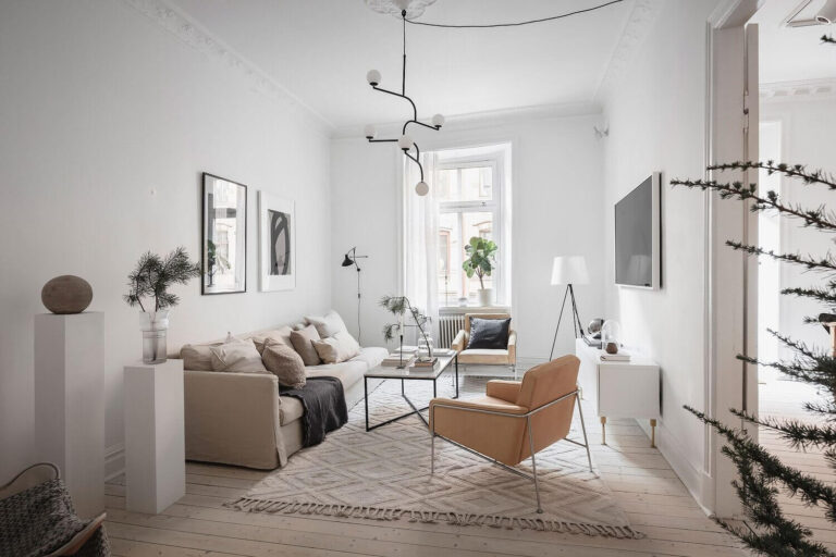 A White Scandinavian Apartment With A Sleek Dark Grey Kitchen - The ...