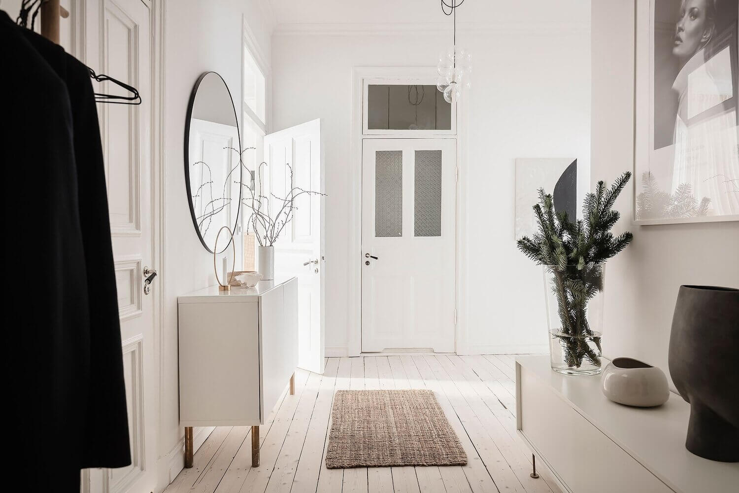white scandinavian apartment grey kitchen nordroom15 A White Scandinavian Apartment With A Sleek Dark Grey Kitchen