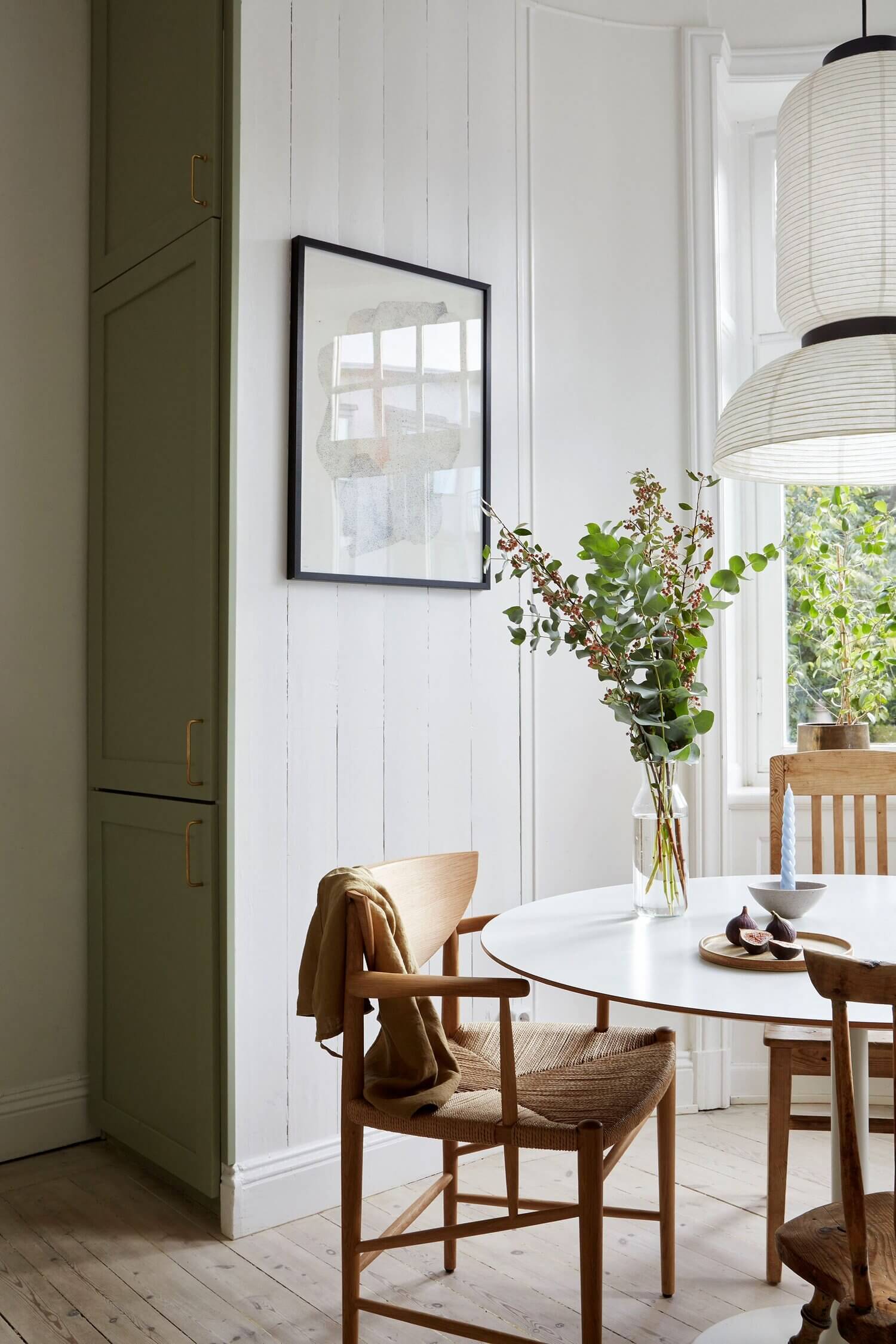 A Scandinavian Apartment With A Mint Green Kitchen