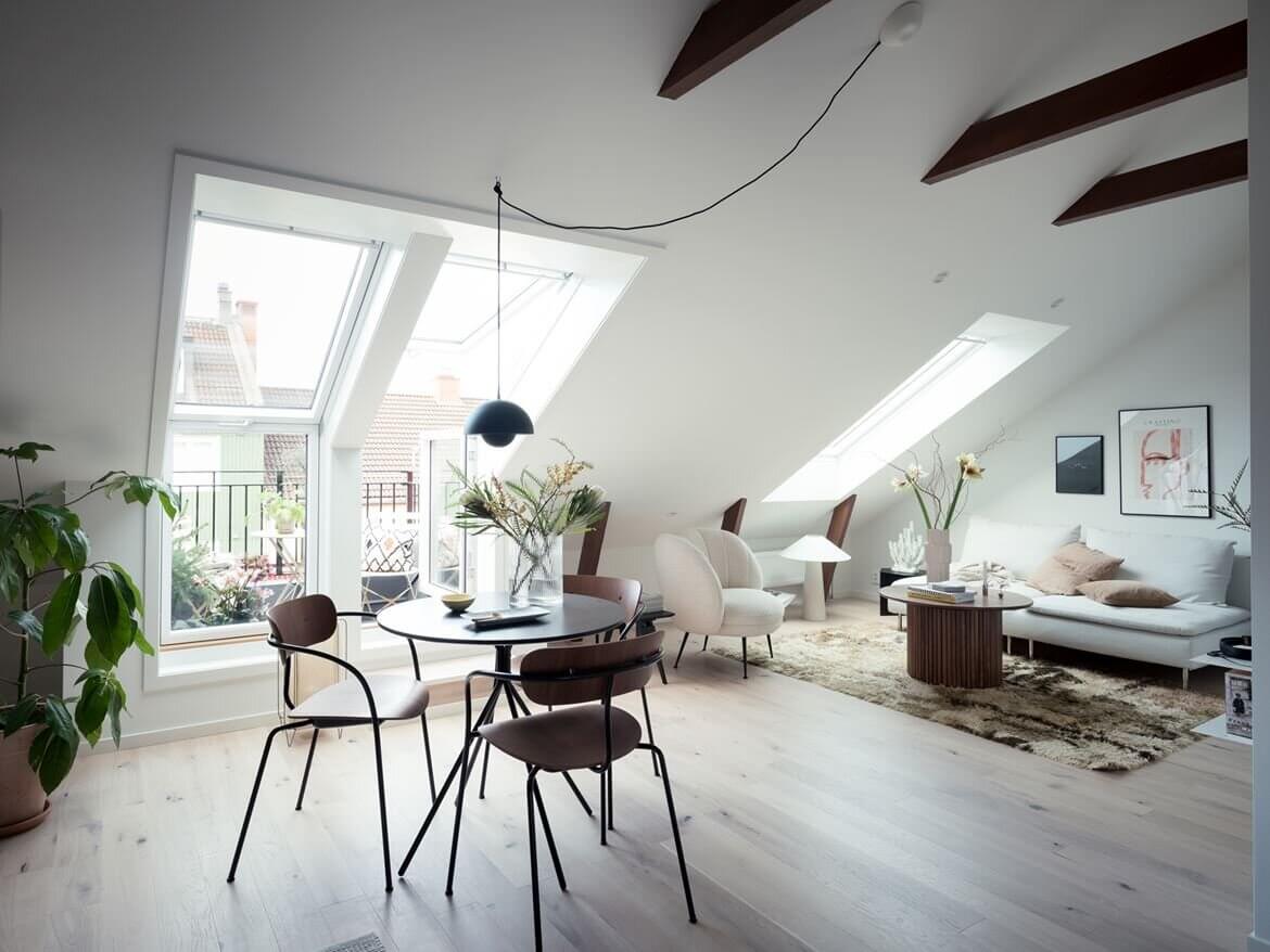 ASmallScandinavianAtticLoftwithExposedBeams TheNordroom A Small Scandinavian Attic Loft with Exposed Beams