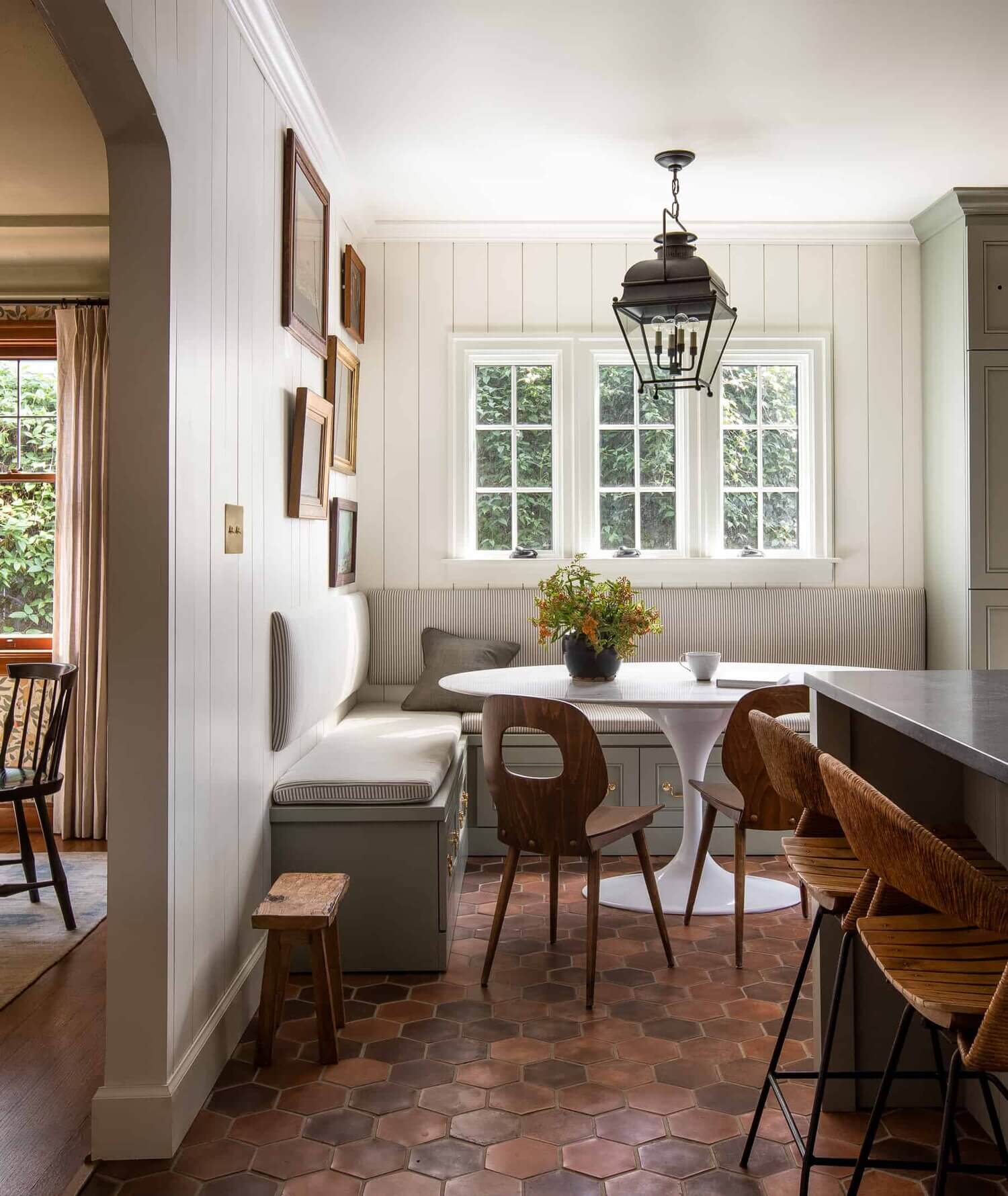 GreenShakerKitchenwithTerracottaFloorandBreakfastNookinDesignerHeidiCailliersWashingtonHome TheNordroom Soothing Colors in Designer Heidi Caillier's Eclectic Washington Home