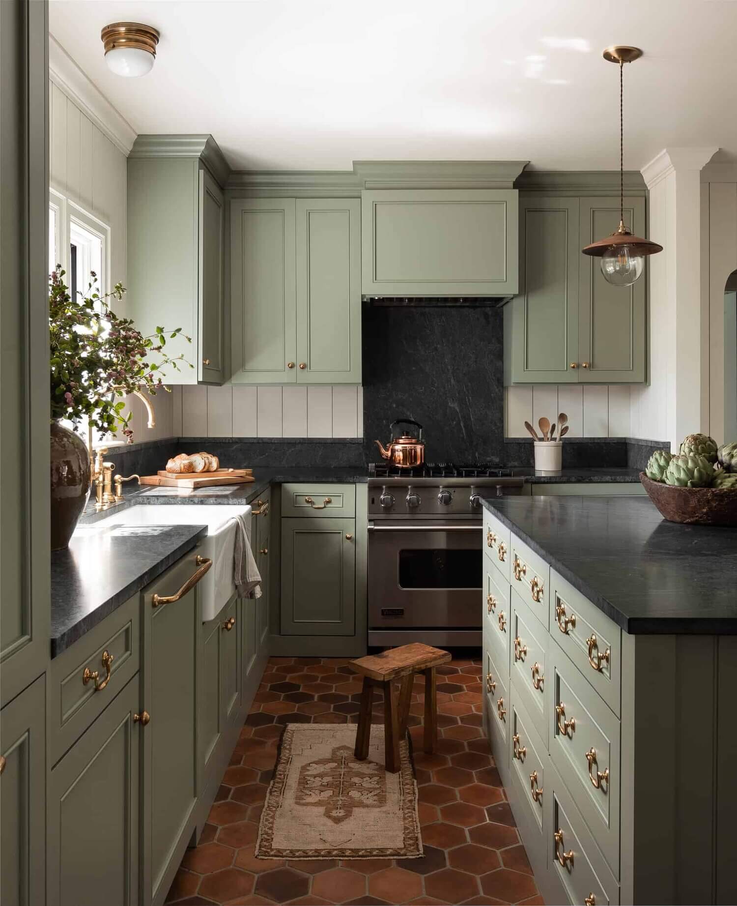 GreenShakerKitchenwithTerracottaFloorinDesignerHeidiCailliersWashingtonHome TheNordroom Soothing Colors in Designer Heidi Caillier's Eclectic Washington Home