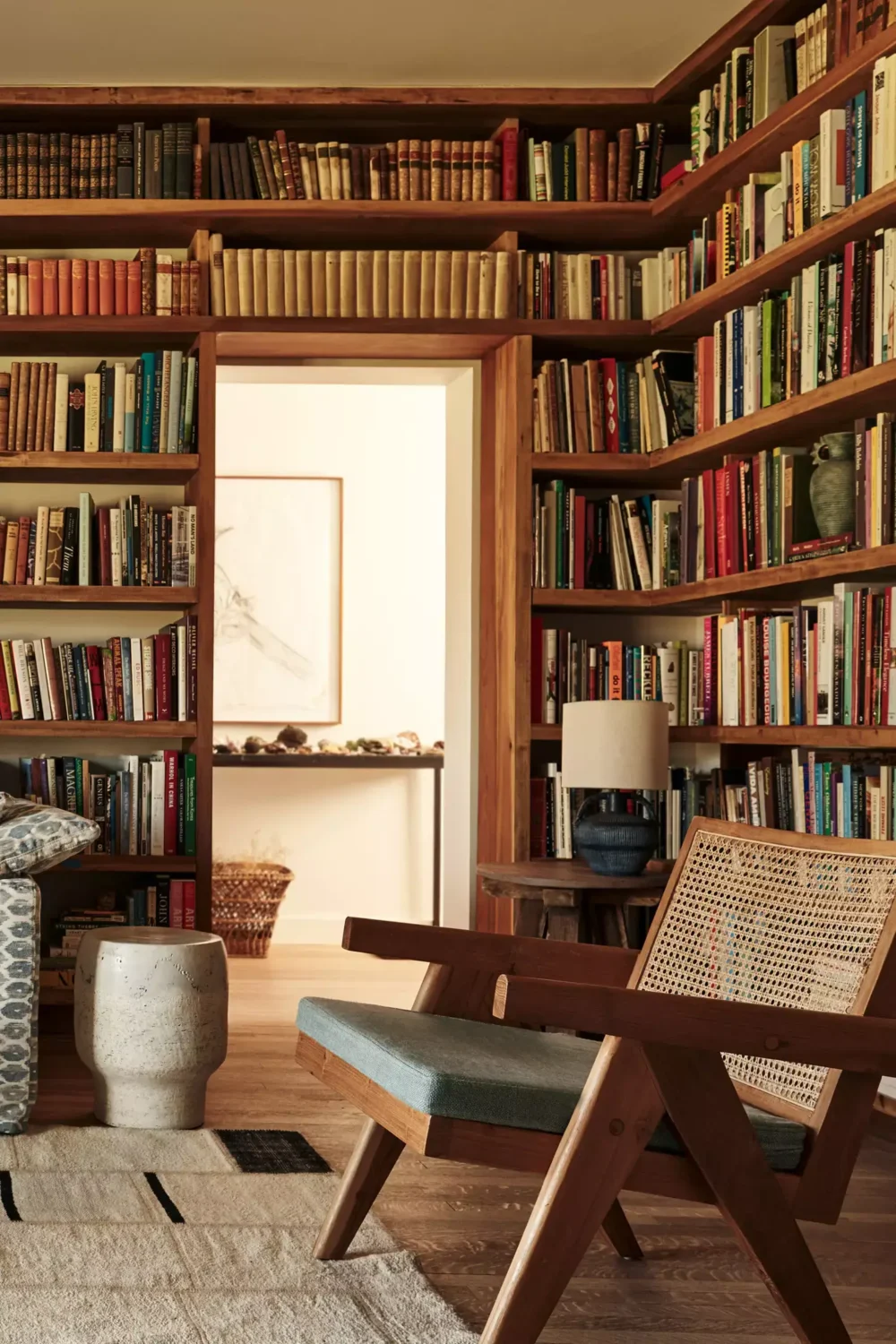 https://www.thenordroom.com/wp-content/uploads/2021/02/warm-wood-home-library-anthropologie-nordroom-1000x1500.webp