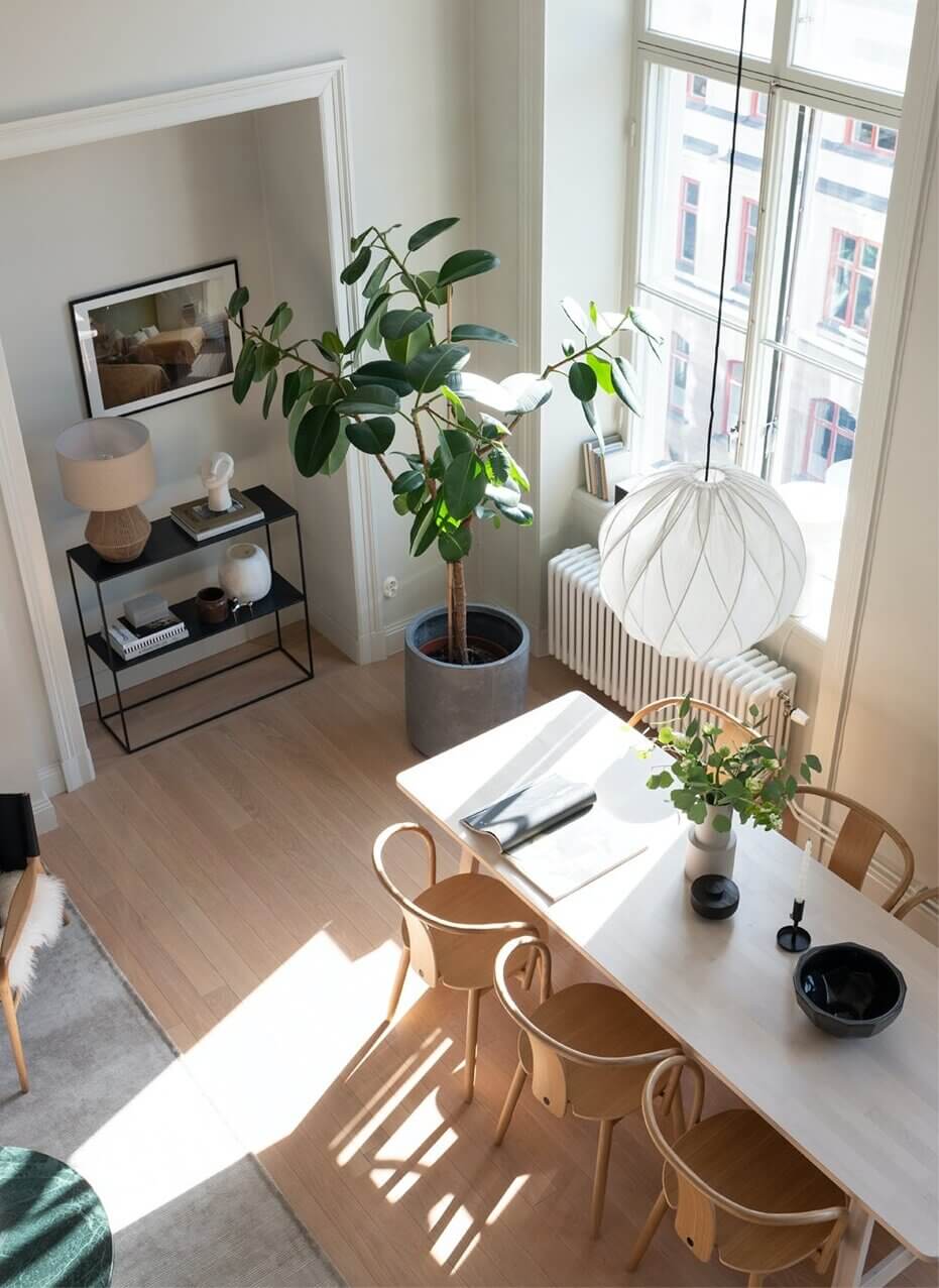 A Scandinavian Loft Apartment with Dark Green Kitchen