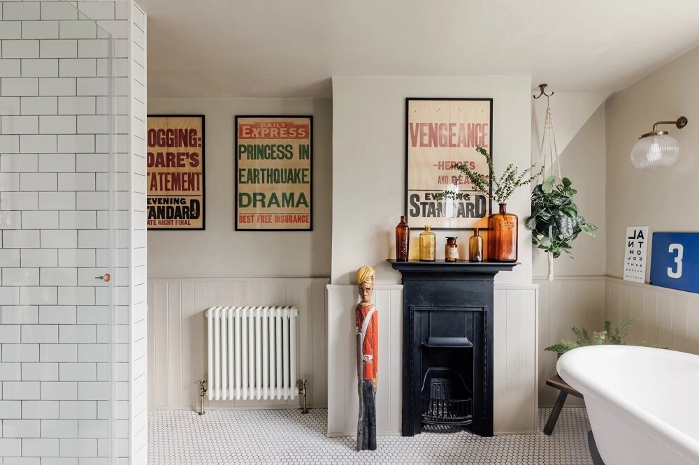 bathroom clawfoot bath fireplace nordroom 1 A Colorful Family Home in London