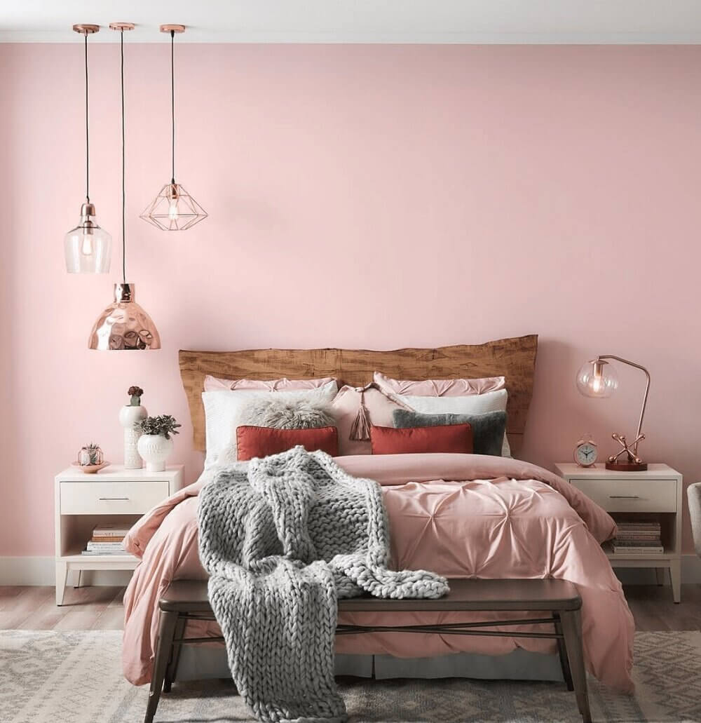 bedroom-pink-wall-wooden-headboard-nordroom