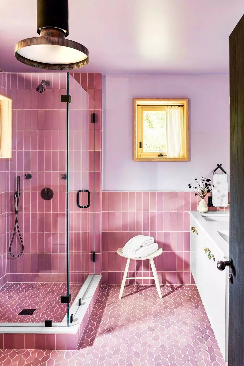 small-pink-bathroom-vertical-tiles-pendant-light-nordroom