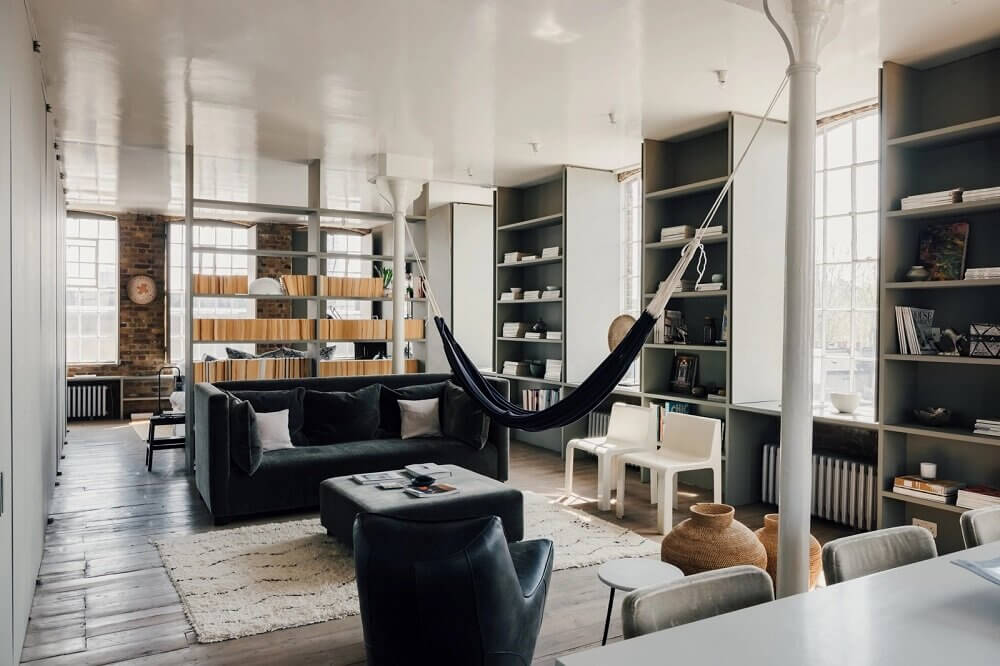 london-loft-ilse-crawford-vincent-van-duysen-grey-bookshelves-hammock-nordroom