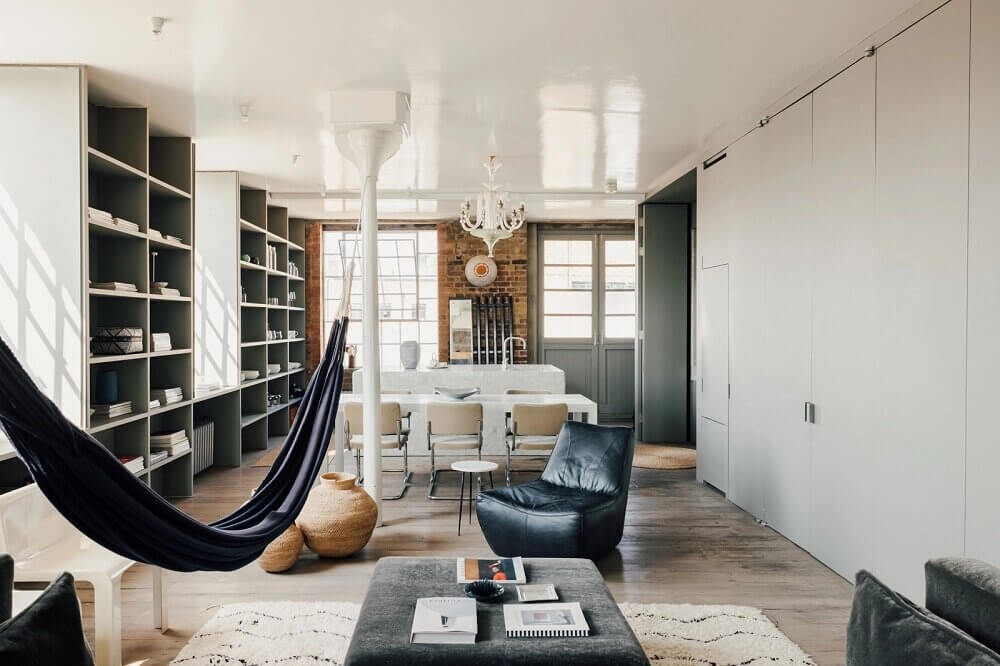 london-loft-ilse-crawford-vincent-van-duysen-grey-bookshelves-hammock-nordroom