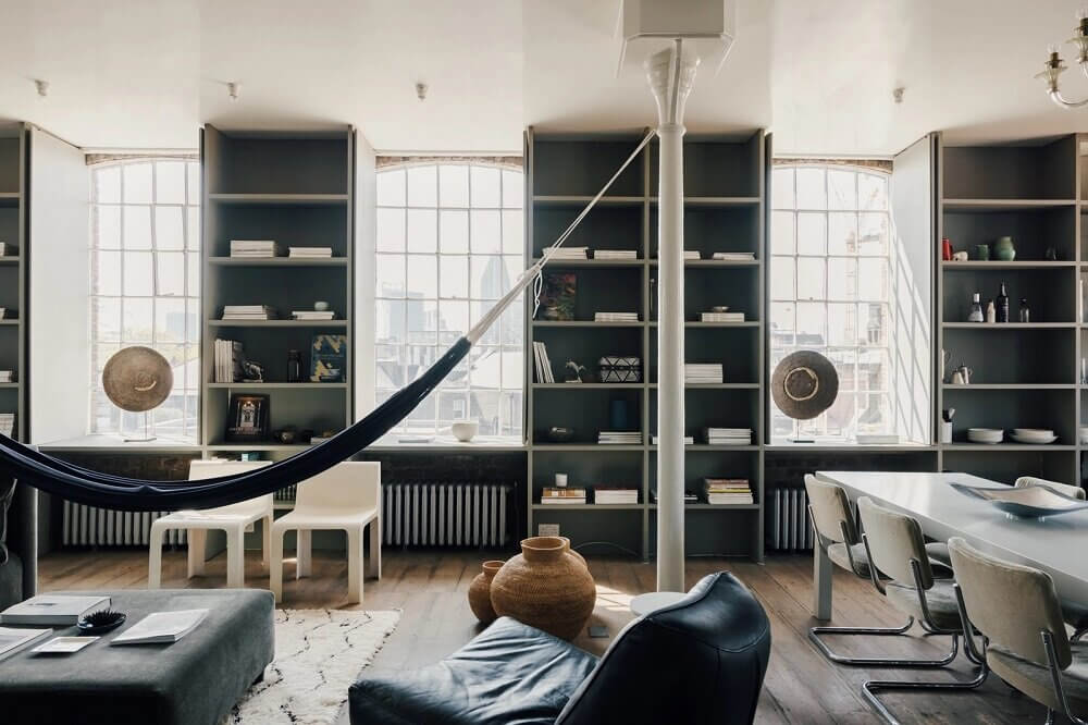 london-loft-ilse-crawford-vincent-van-duysen-grey-bookshelves-hammock-nordroom