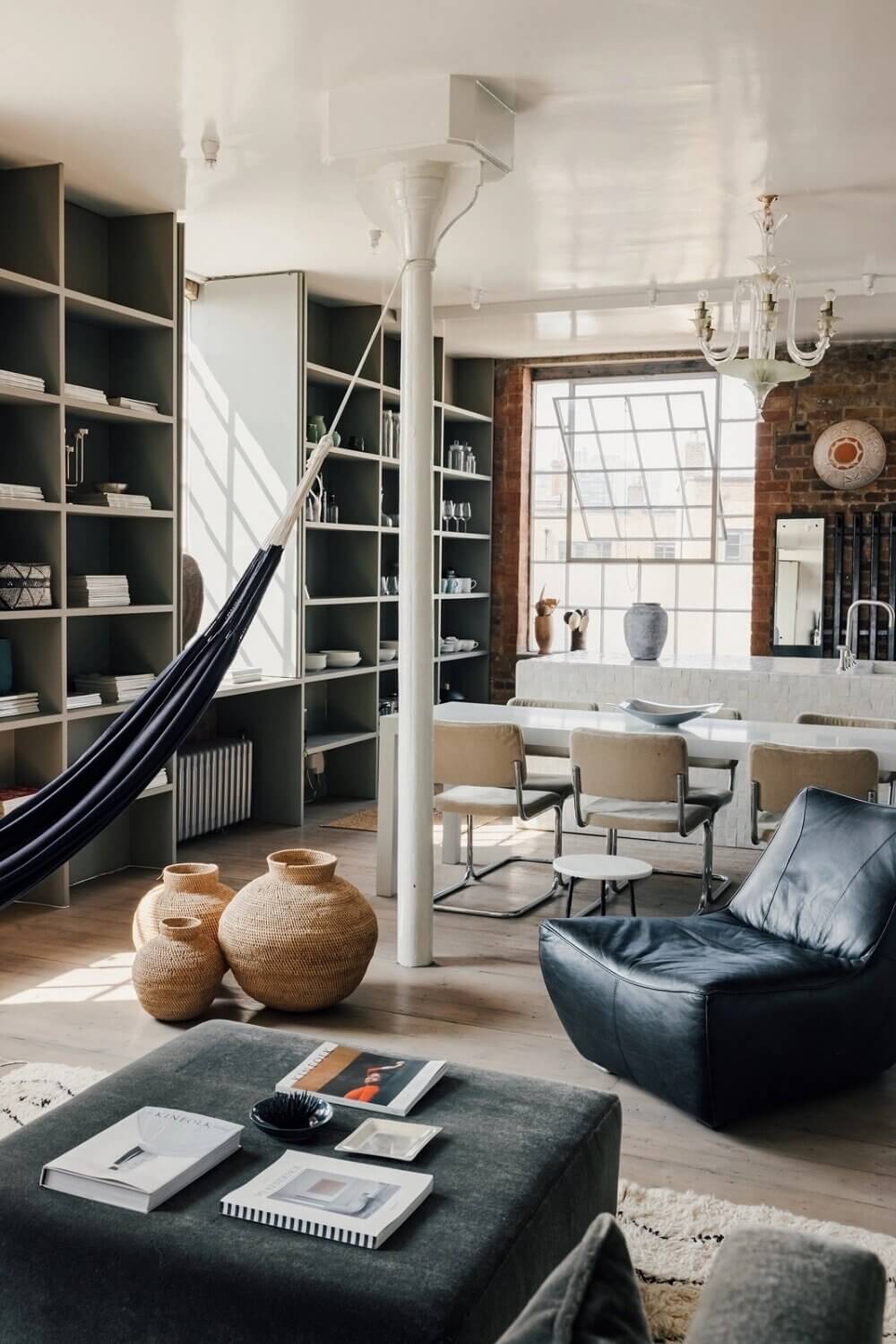 london-loft-ilse-crawford-vincent-van-duysen-grey-bookshelves-hammock-nordroom