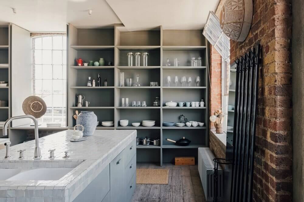 london-loft-ilse-crawford-vincent-van-duysen-grey-bookshelves-kitchen-island--zellige-tiles-brick-wall-victorian-warehouse-conversion-nordroom