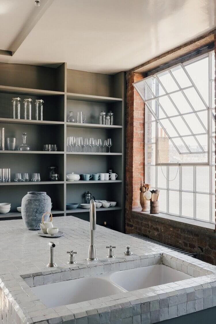 london-loft-ilse-crawford-vincent-van-duysen-grey-bookshelves-kitchen-island--zellige-tiles-brick-wall-victorian-warehouse-conversion-nordroom