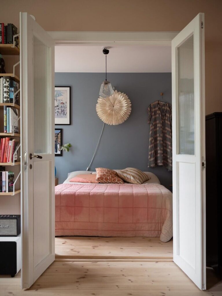 Image showcasing A Pink and Blue Scandinavian Apartment - The Nordroom