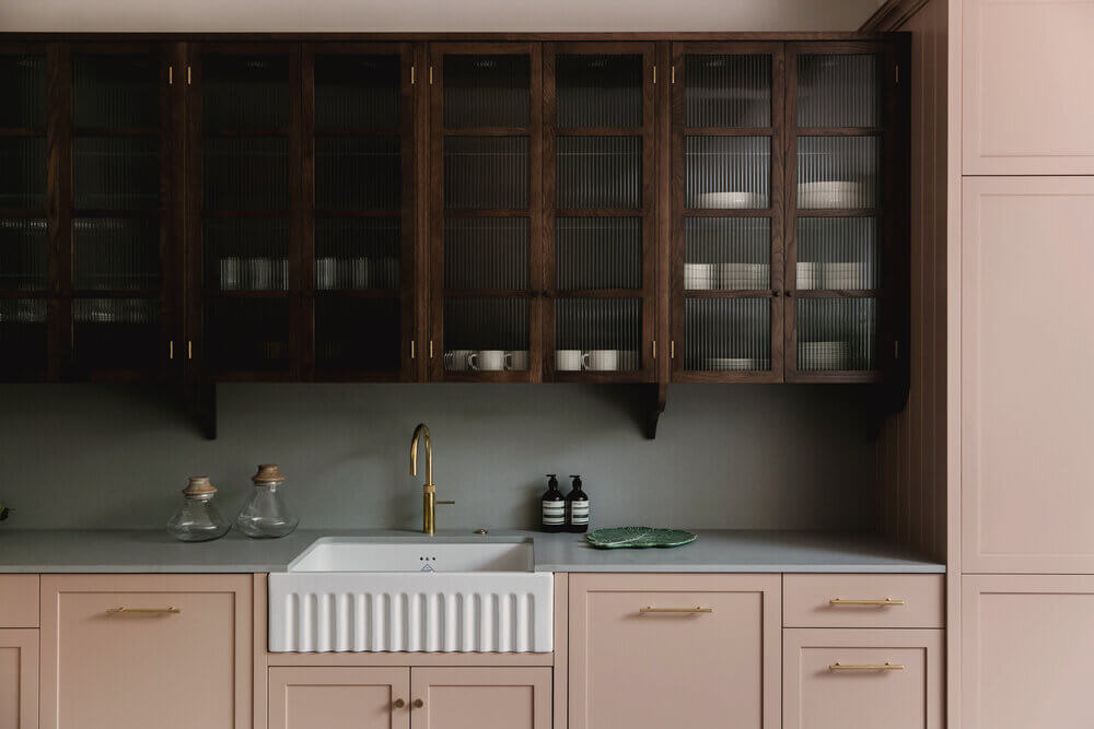 pink-kitchen-ribbed-glass-cabinets-terrazzo-floor-london-studio-duggan-nordroom