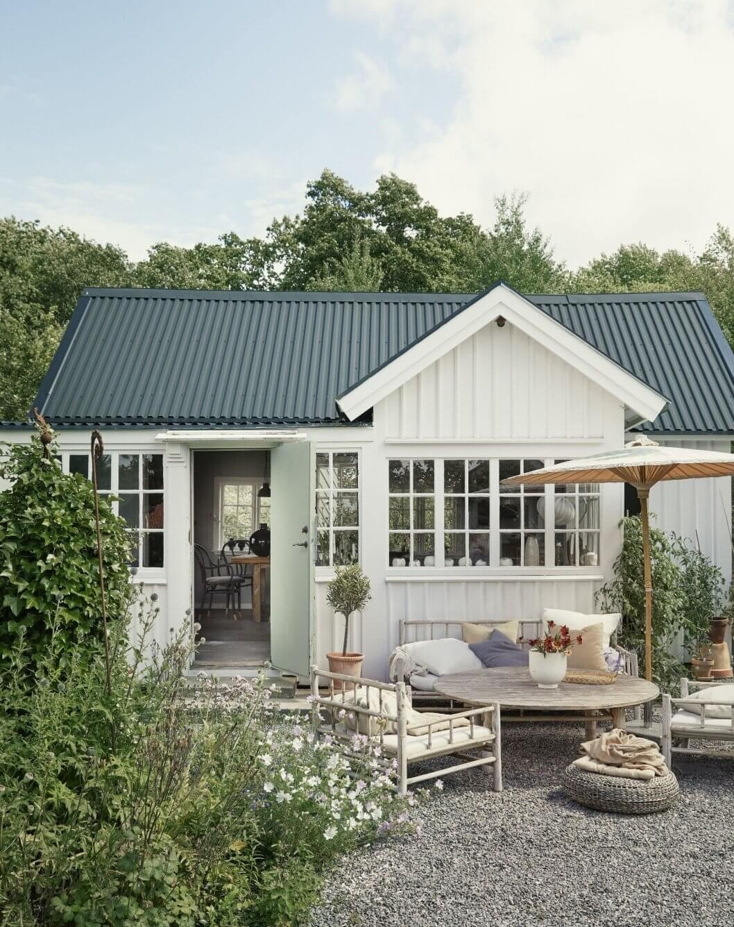 A Small Farmhouse-Style Cottage on a Swedish Allotment