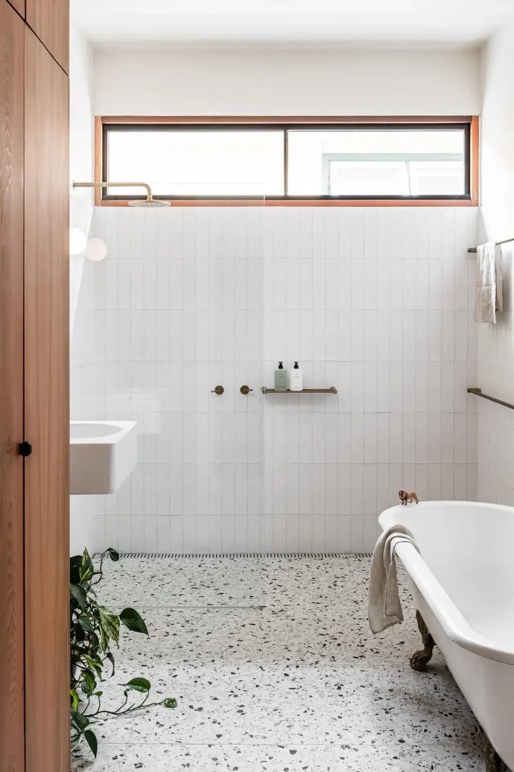 vertical-wall-tiles-small-light-bathroom-nordroom