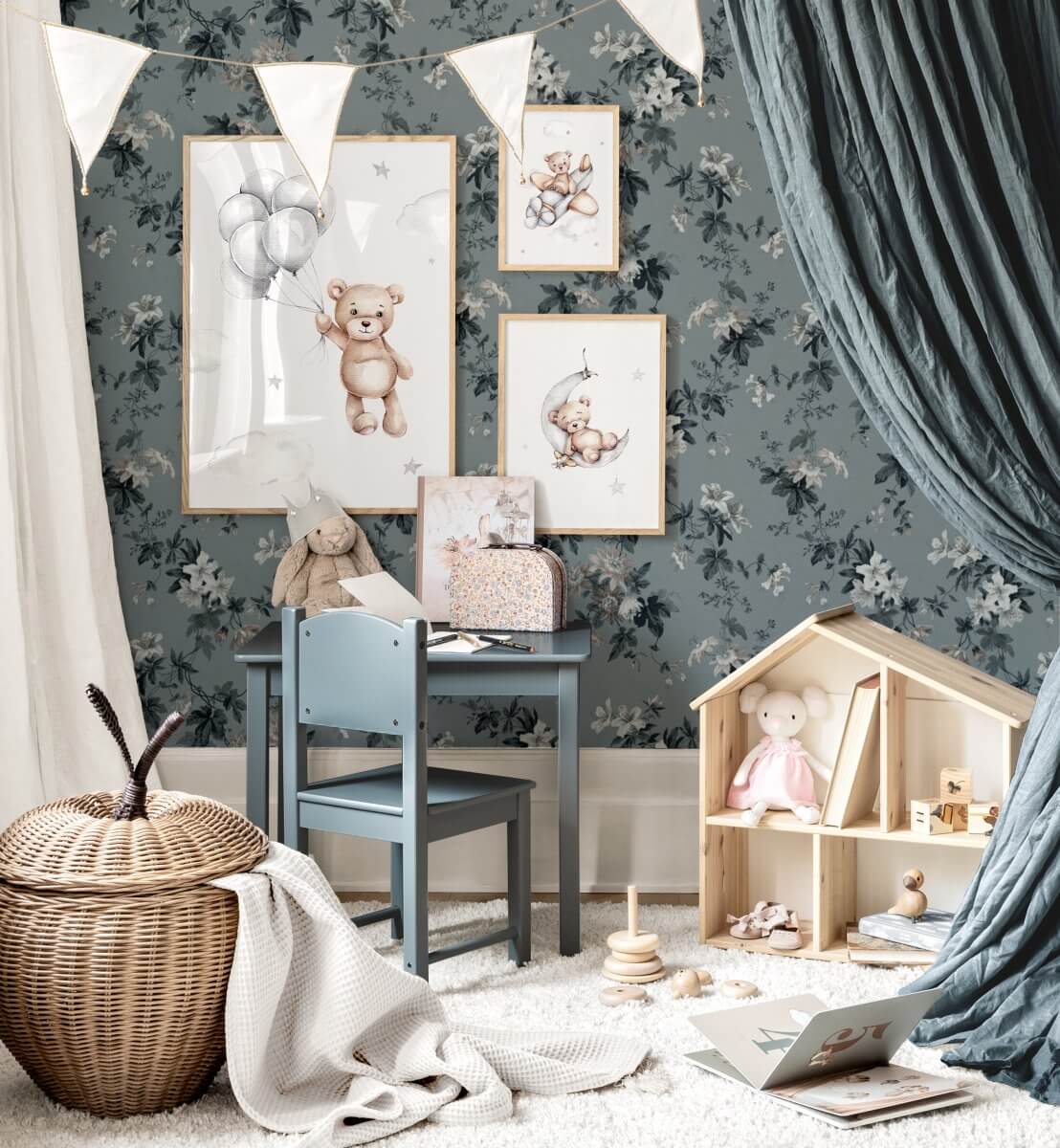 childrens room with blue wallpaper and teddy posters nordroom