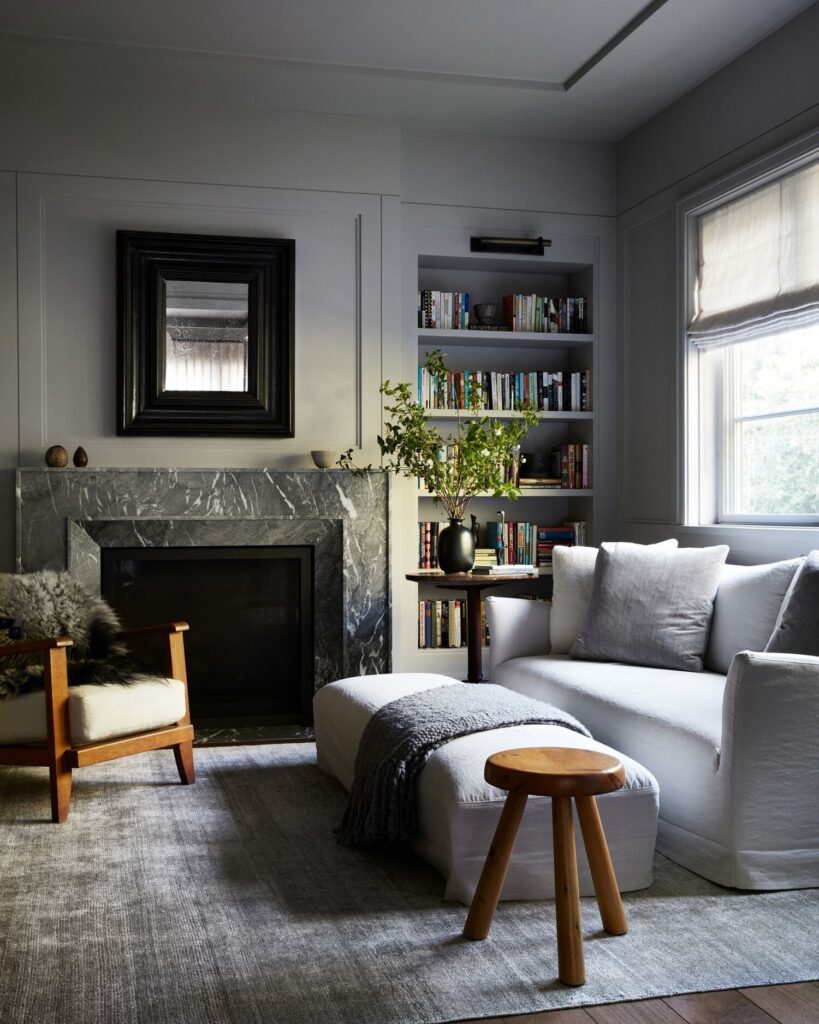 grey living room fireplace nordroom 1 These Paint Colors Increase The Value of Your Home
