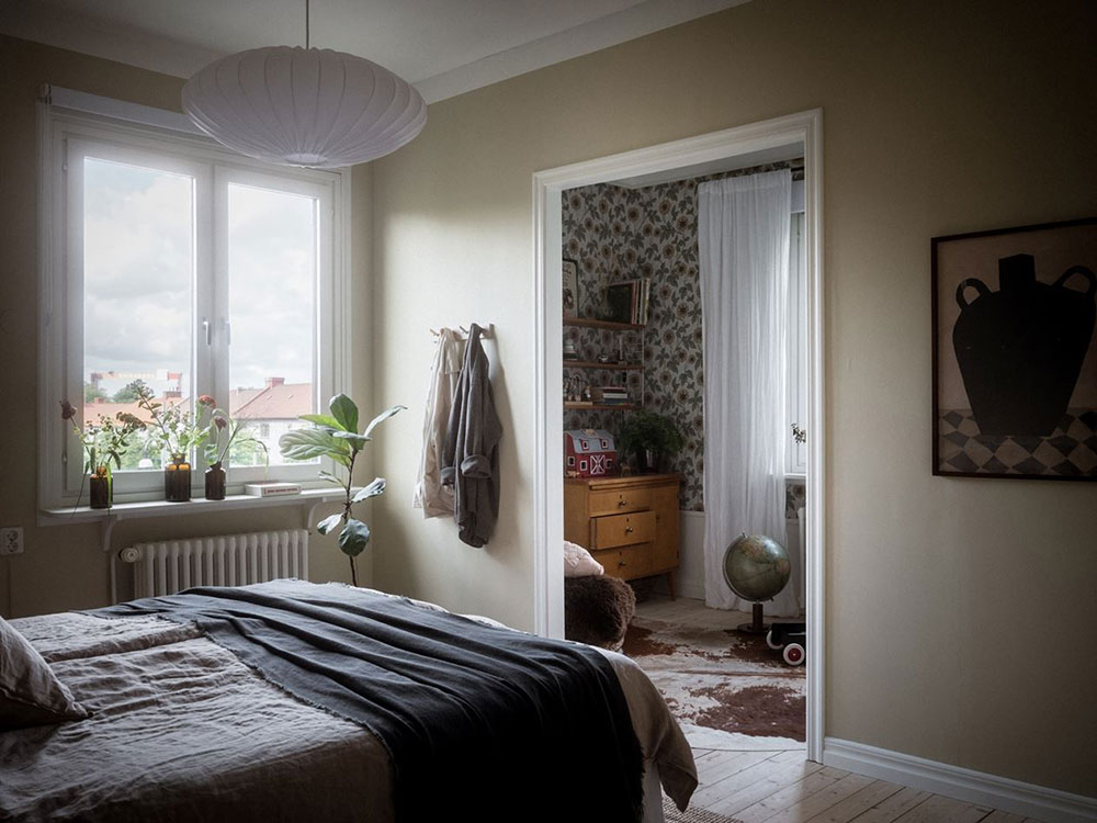 moody-green-living-room-scandinavian-apartment-nordroom