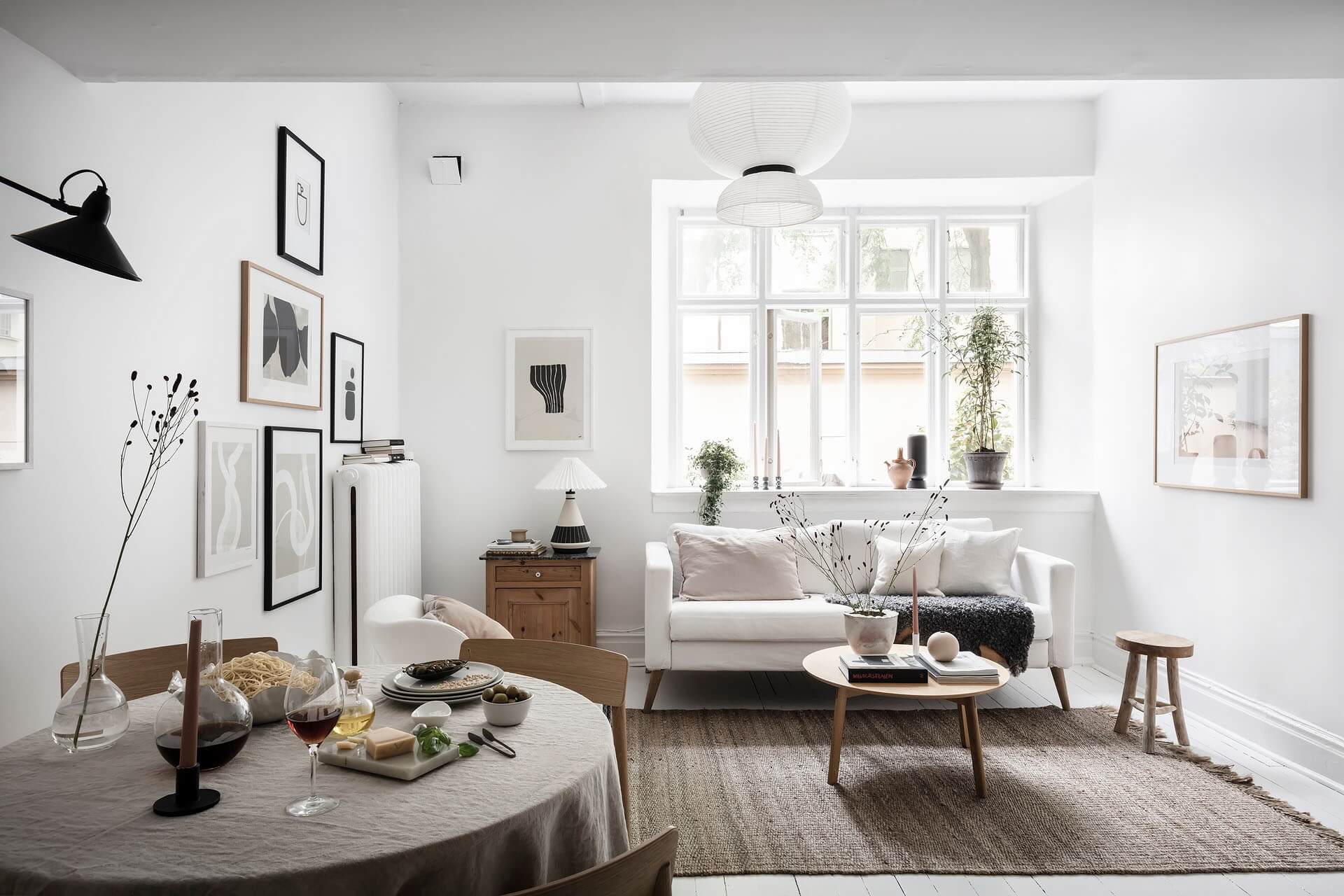 A White Scandinavian Studio Apartment With Loft Bed