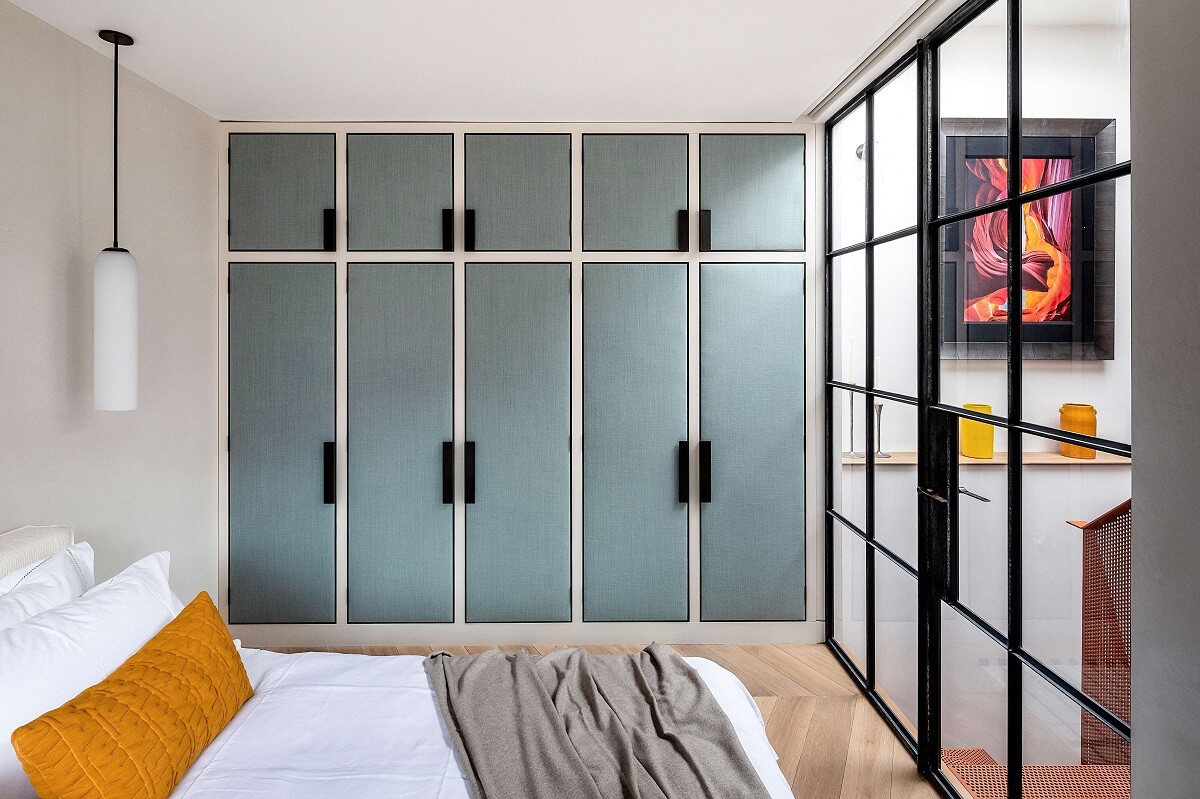 bedroom-blue-closets-steel-glass-wall-nordroom