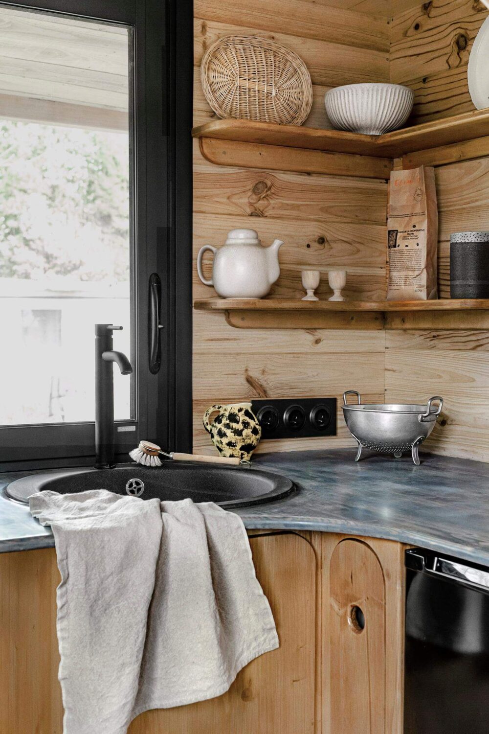 tiny-house-curved-kitchen-open-shelves-nordroom