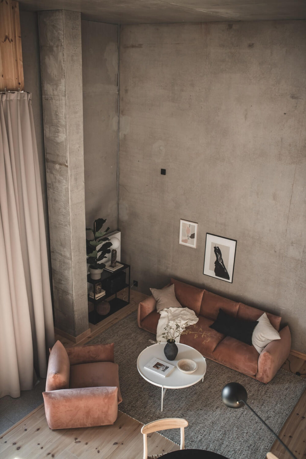 conrete-living-room-loft-high-ceilings-nordroom