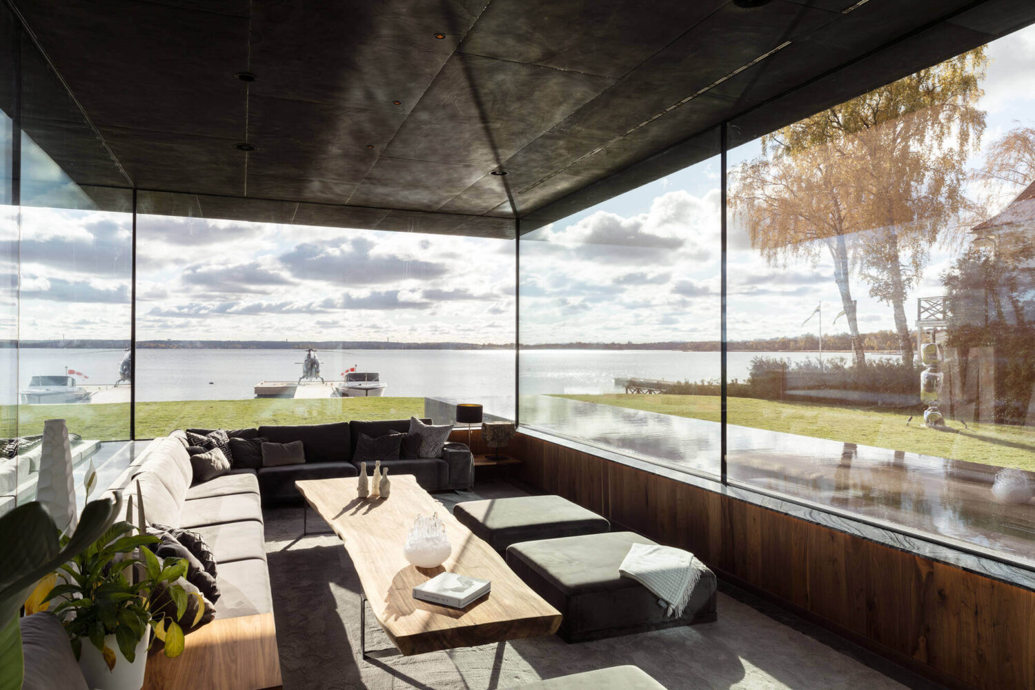 glass-sitting-room-modern-architectural-villa-stockholm-sweden-nordroom