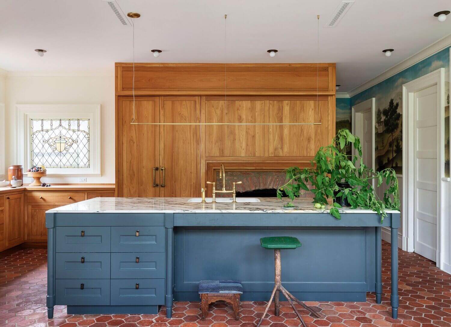 hexagon-terracotta-floor-tiles-kitchen-blue-kitchen-island-nordroom