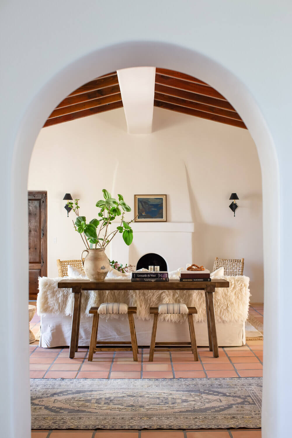 light-living-room-ceiling-beams-terracotta-floor-nordroom