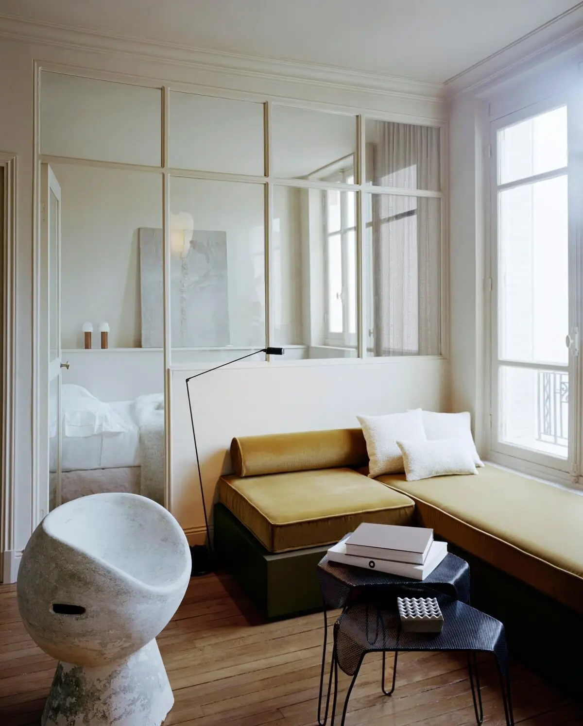 living-area-custom-seating-glass-partition-wall-pied-a-terre-paris-corpus-studio-nordroom