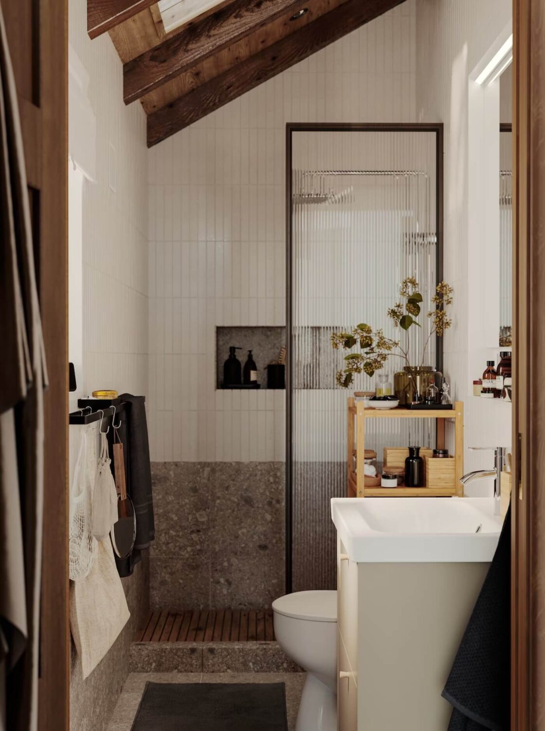 small bathroom slanted wooden ceiling ribbed glass shower glass storage niches nordroom