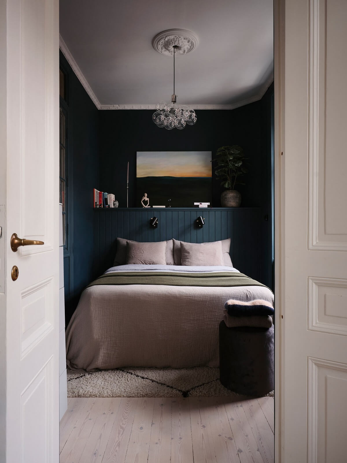 Apartment with Small Dark Blue Bedroom