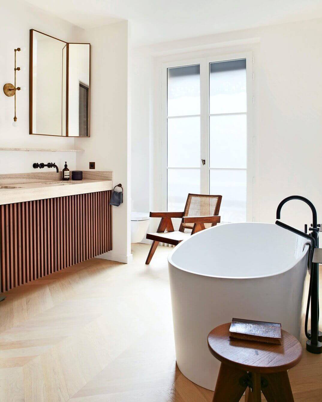 19th paris apartment modern classic design ribbed wood bathroom nordroom How To Style Your Home Like A Parisian Apartment