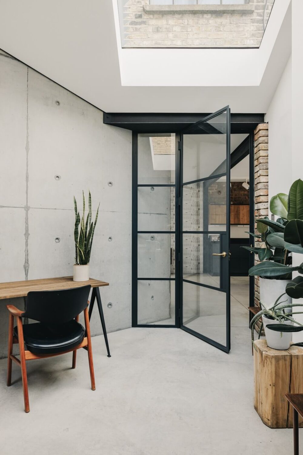 home-office-skylight-industrial-doors-concrete-nordroom