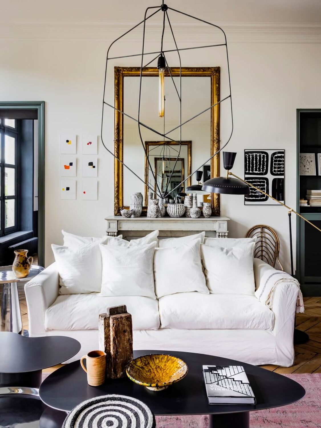 living-room-antique-mirror-paris-apartment-merci-nordroom