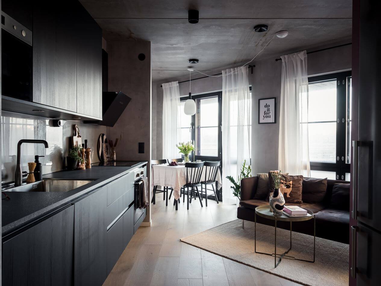 living-room-black-kitchen-concrete-walls-nordroom