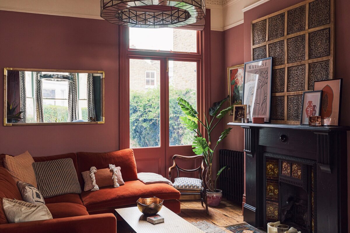 pink-sitting-room-black-fireplace-wooden-floor-london-house-nordroom