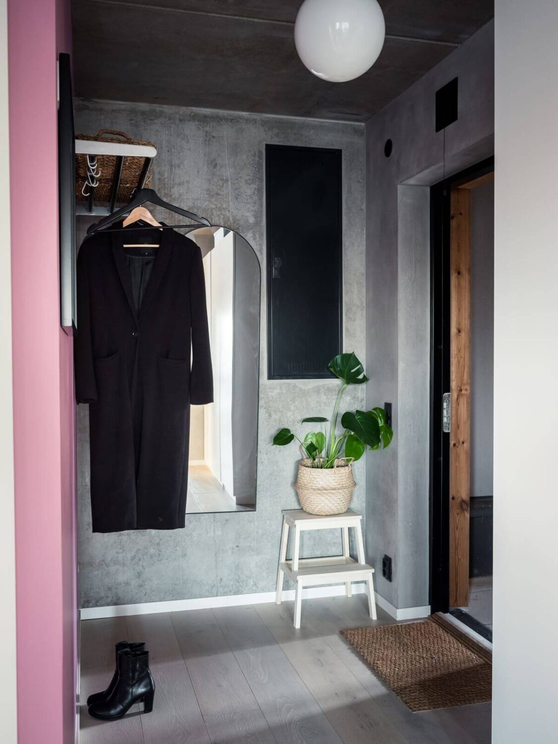 small-hallway-concrete-walls-industrial-scandinavian-apartment-nordroom
