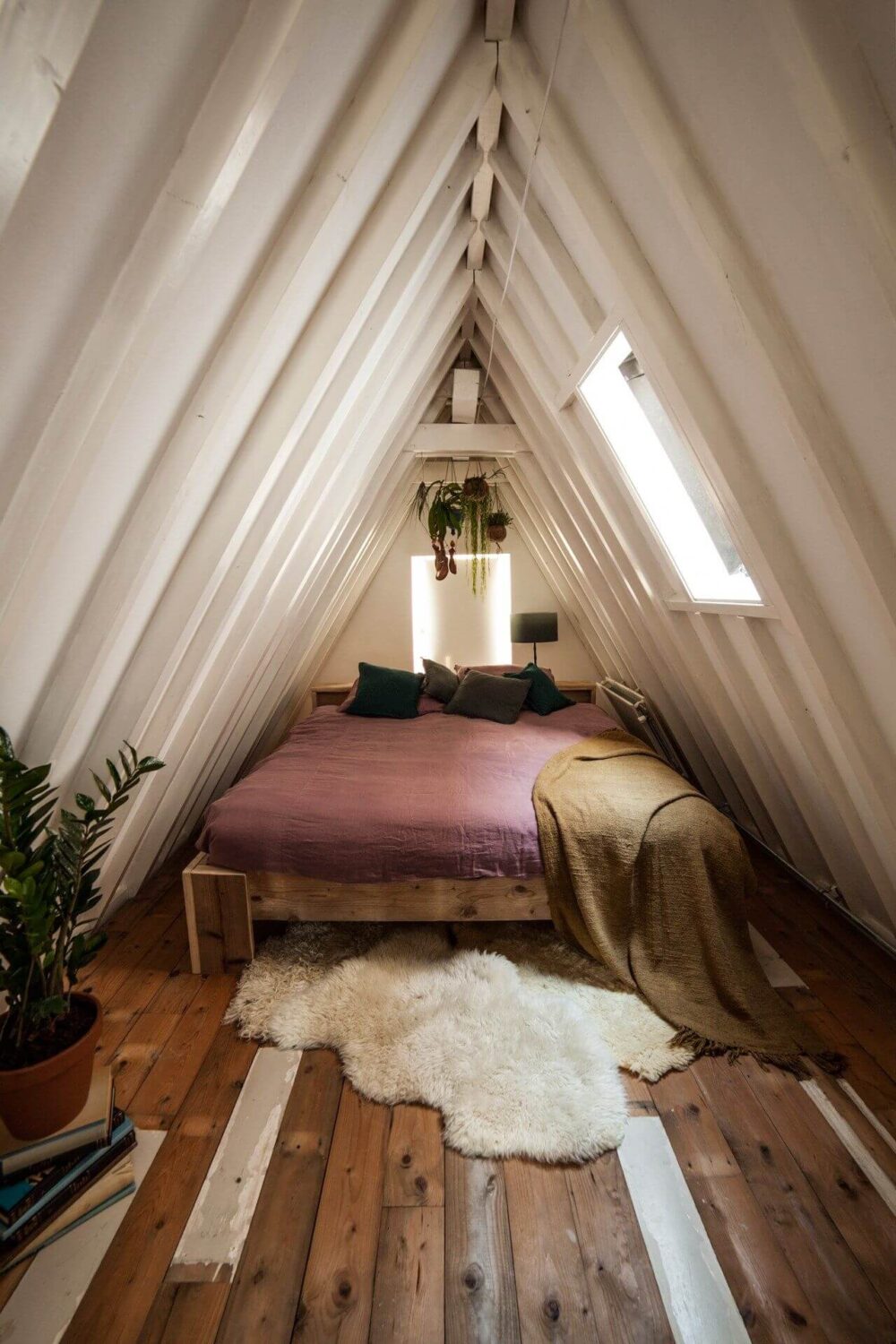 attic-bedroom-beams-plants-nordroom